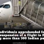 Two individuals apprehended following the suspension of a flight in France carrying more than 300 Indian passengers.